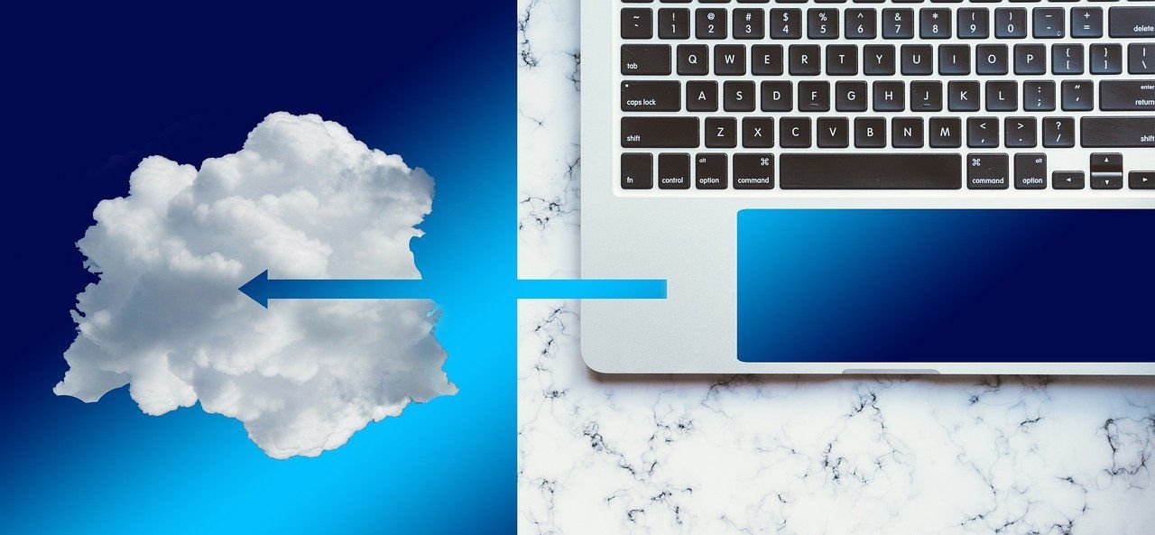 cloud and a laptop depicting cloud storage