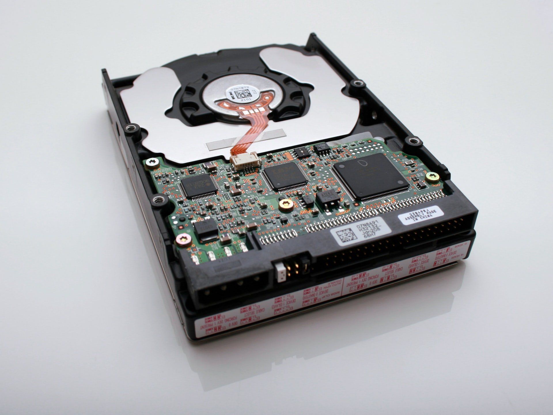 Image of the inside of a CD rom drive, showing the benefits of cloud storage