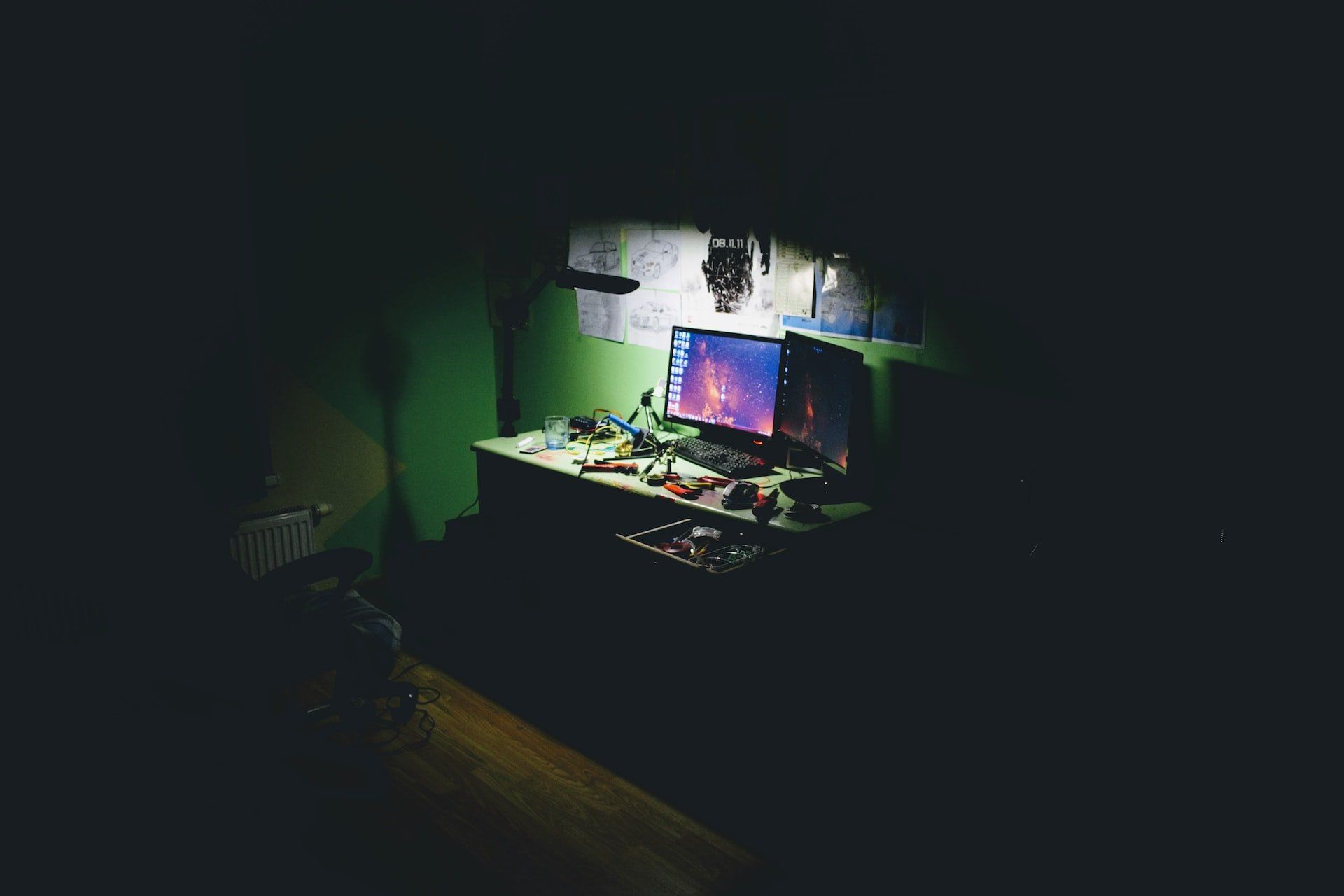 a hacker's computer in the dark