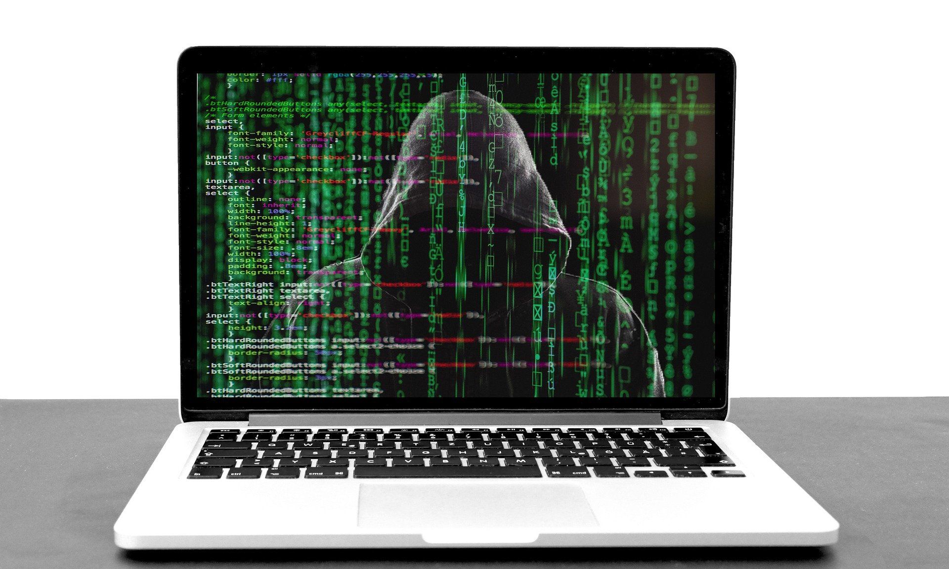 Image of a laptop screen with code and a scary hacker