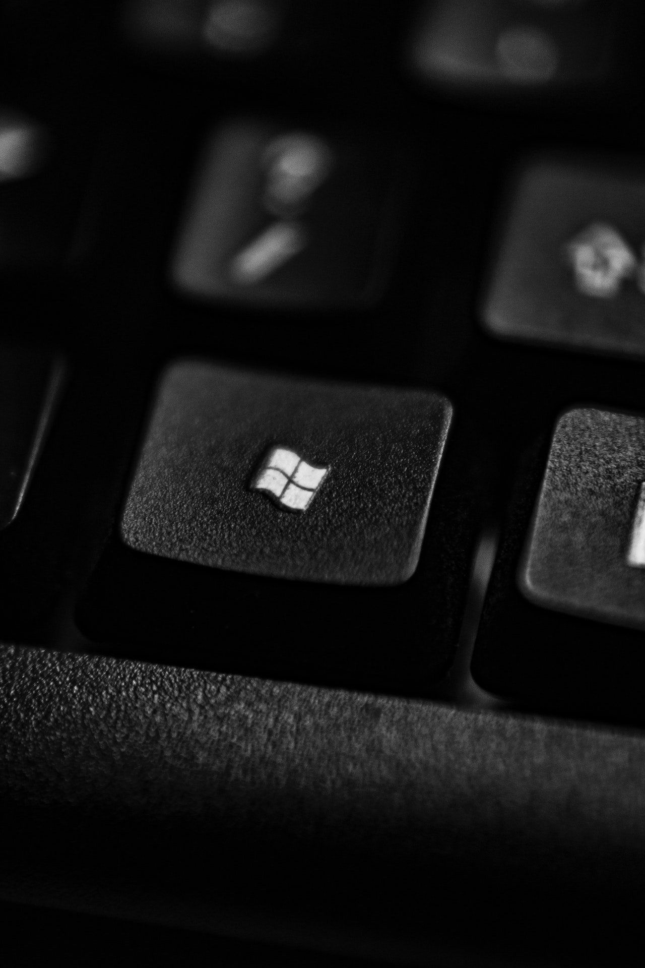 the Microsoft logo on a computer keyboard