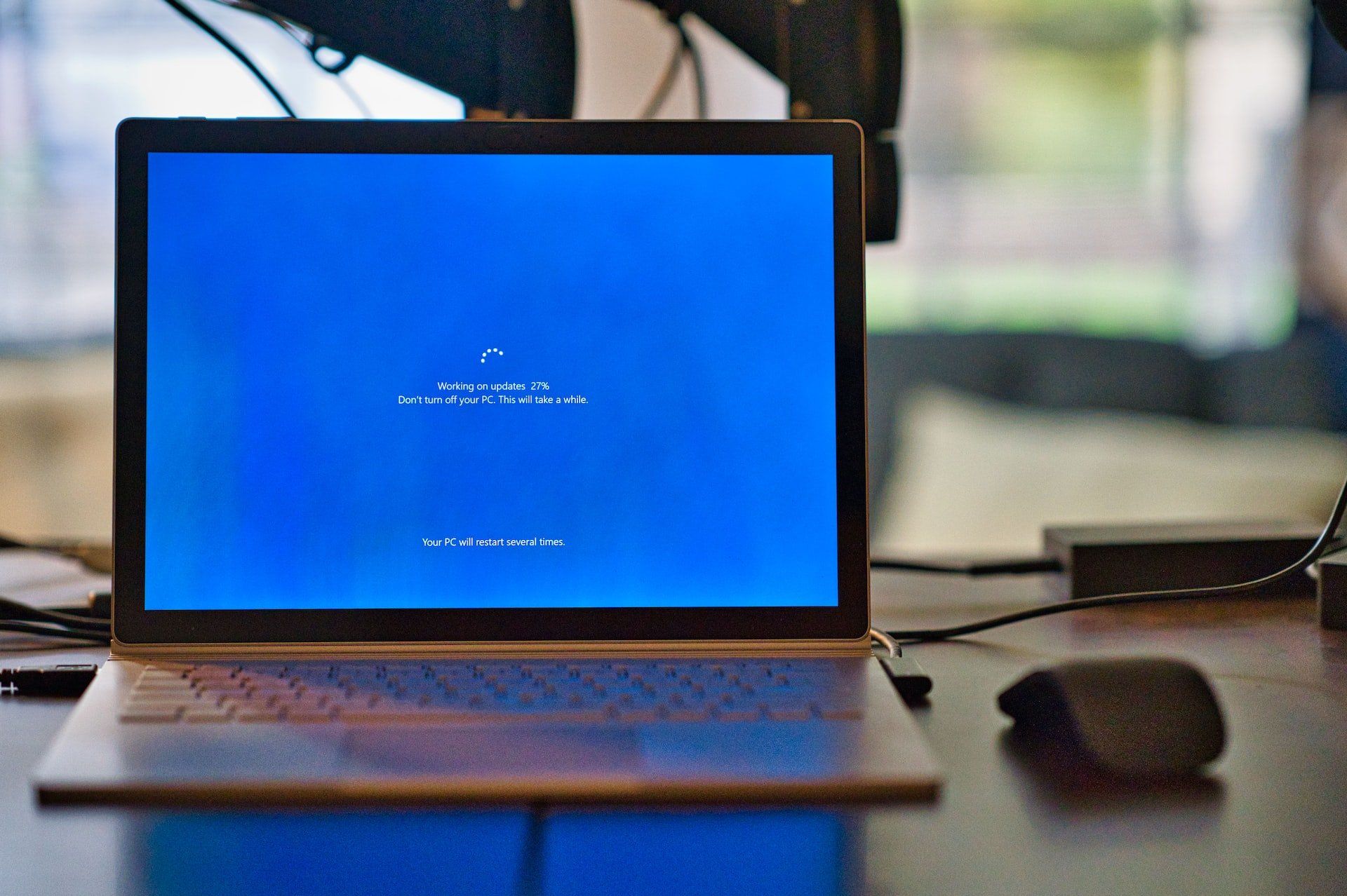 Image of a laptop running a Microsoft software update