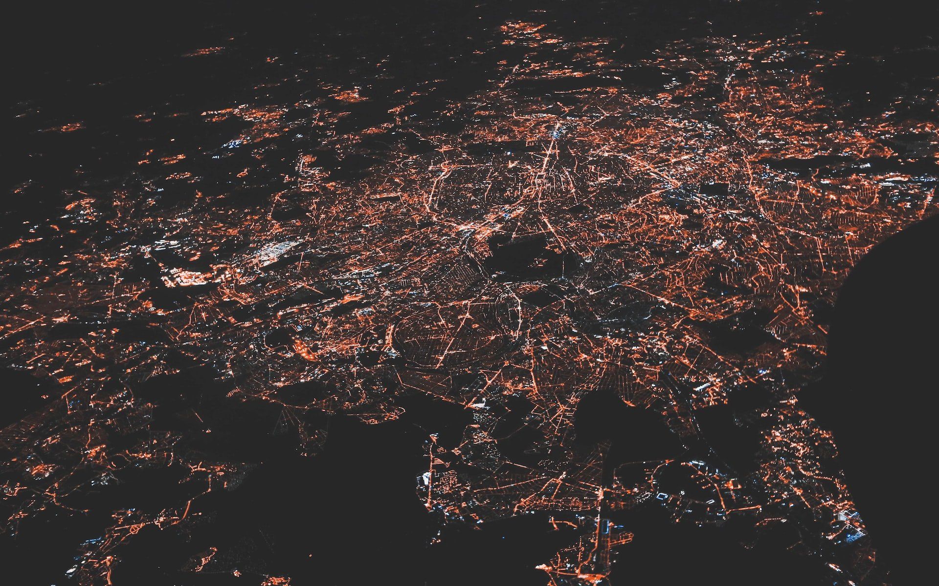 Image of city lights from the sky, showing how connected we are via technology