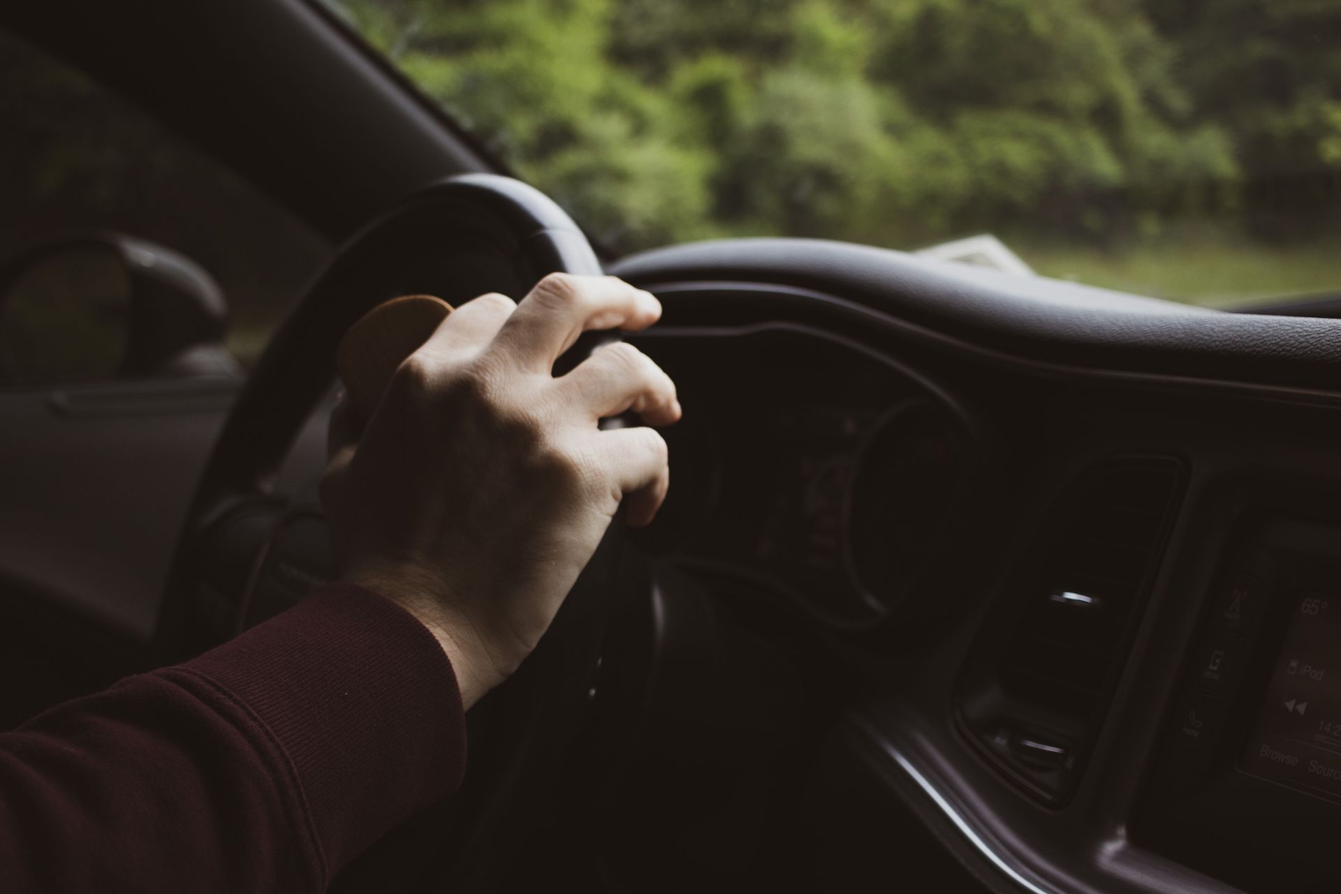 Driver Grasping Steering Wheel in Deer Park, TX