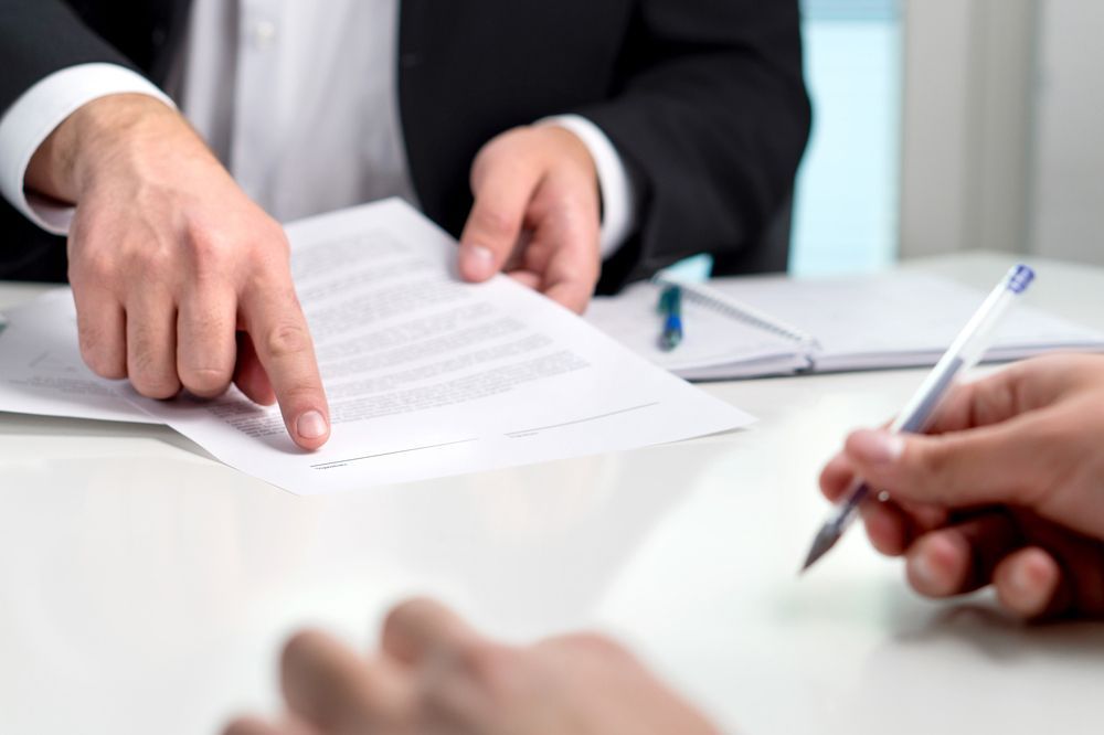 Signing a contract or agreement — Employment Law Solicitors in Muswellbrook NSW