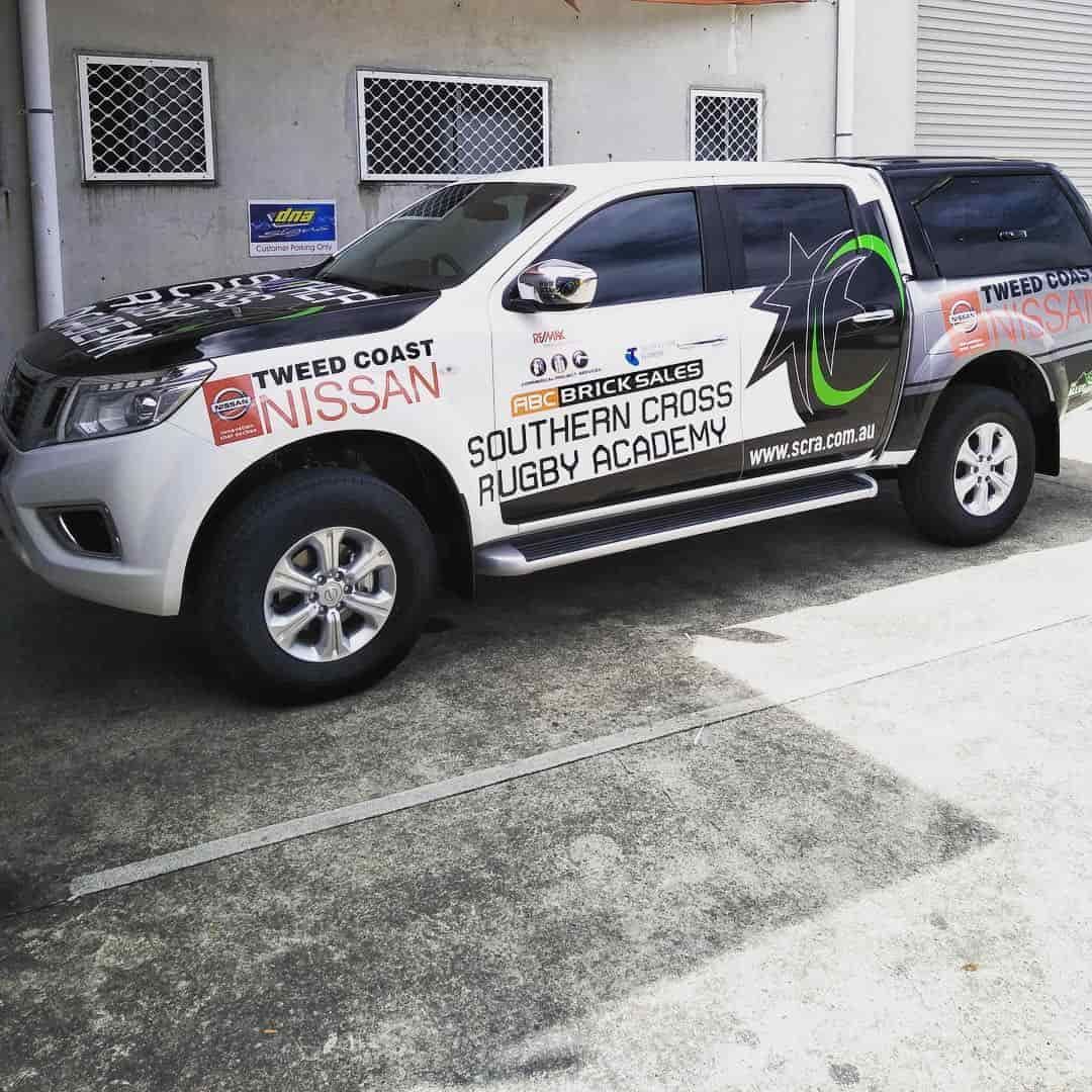Southern Cross Academy Ute with Graphics — DNA Signs in Brisbane, QLD