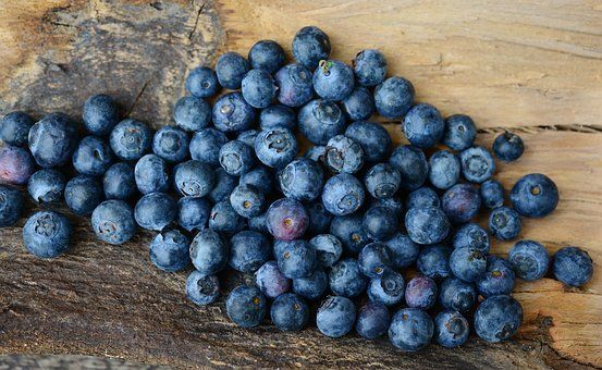 Blue Berries on Cutting Board
