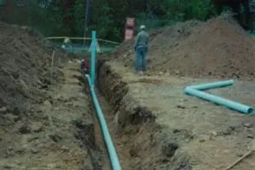 A Man Standing In A Trench — Delaware County, PA — J.L. Latsios Paving Co. Inc.