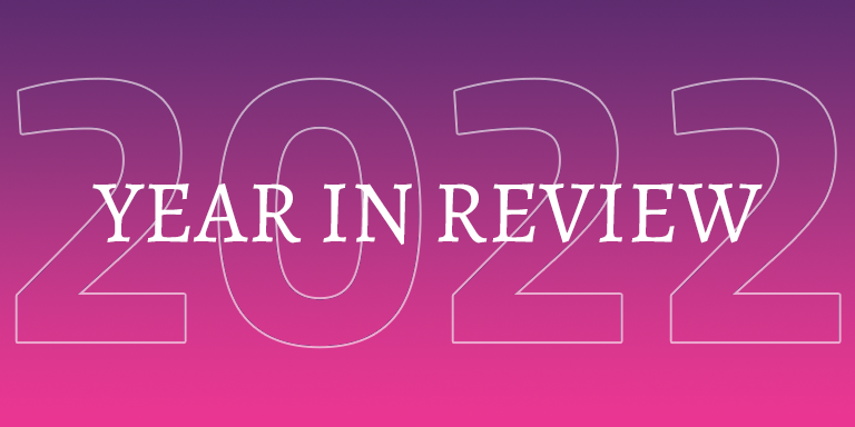 The year in review is written in white letters on a pink and purple background.