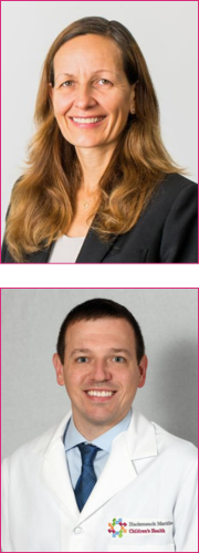 A man and a woman are smiling for the camera.