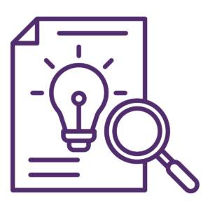 A light bulb is sitting on a piece of paper next to a magnifying glass.