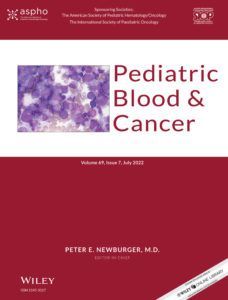 A red book titled pediatric blood and cancer