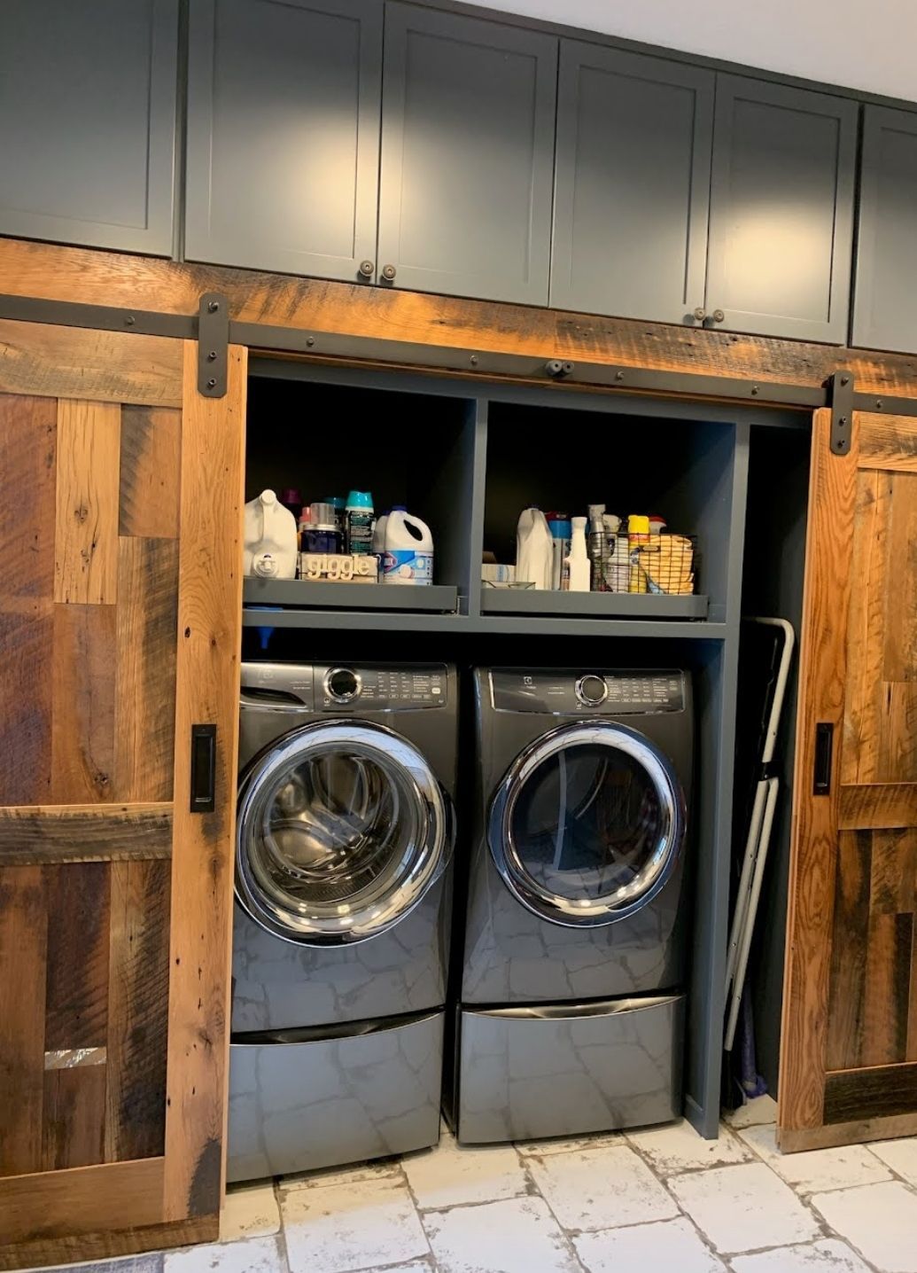 A laundry room with a washer and dryer