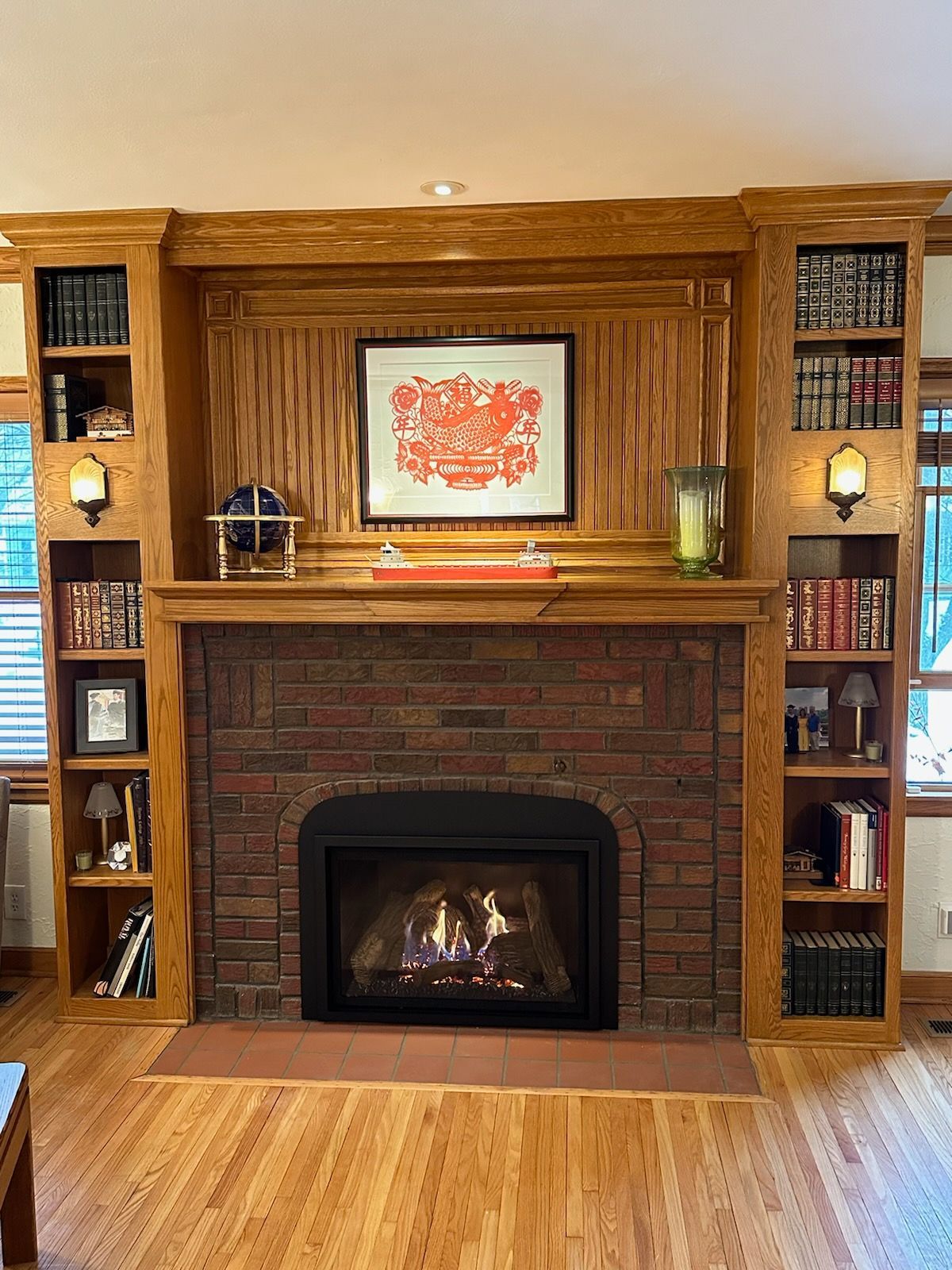 There is a fireplace in the middle of the room.