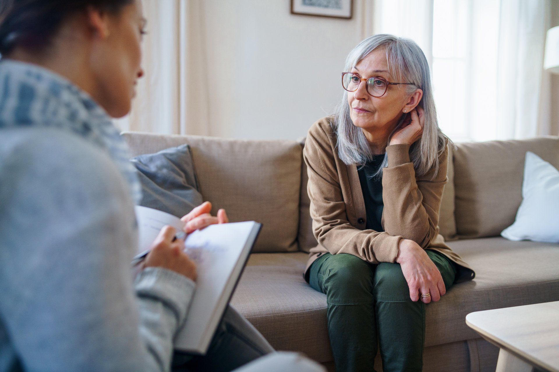 Woman Psychologist Talking to Patient | Rochester, NY | Laurie Burns LCSW-R CGP