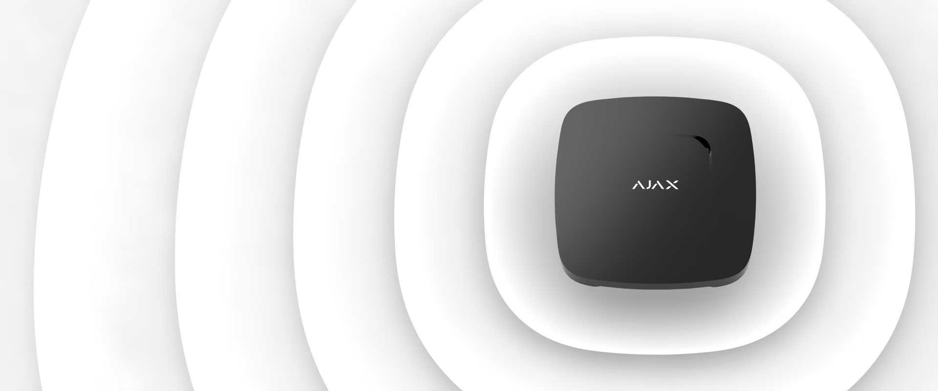 A Square Black Fire Detector Centered Against A Background Of Concentric White Rounded Rectangular Rings — Cussler NQ in Hamilton Island, QLD