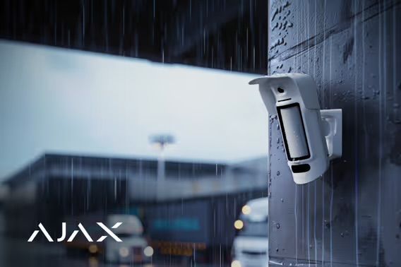 White Security Camera Mounted on a Wall in the Rain — Cussler NQ in Cannonvale, QLD