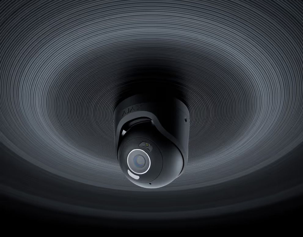 Black Security Camera Mounted on a Textured, Circular Ceiling — Cussler NQ in Cannonvale, QLD