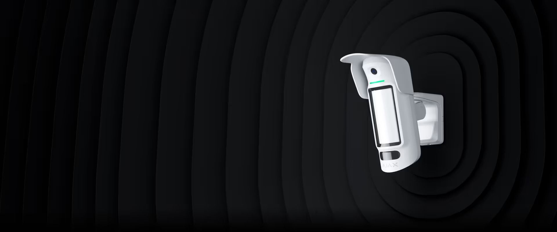 White Security Camera Mounted on a Dark Wall With Concentric Oval Patterns — Cussler NQ in Bowen, QLD