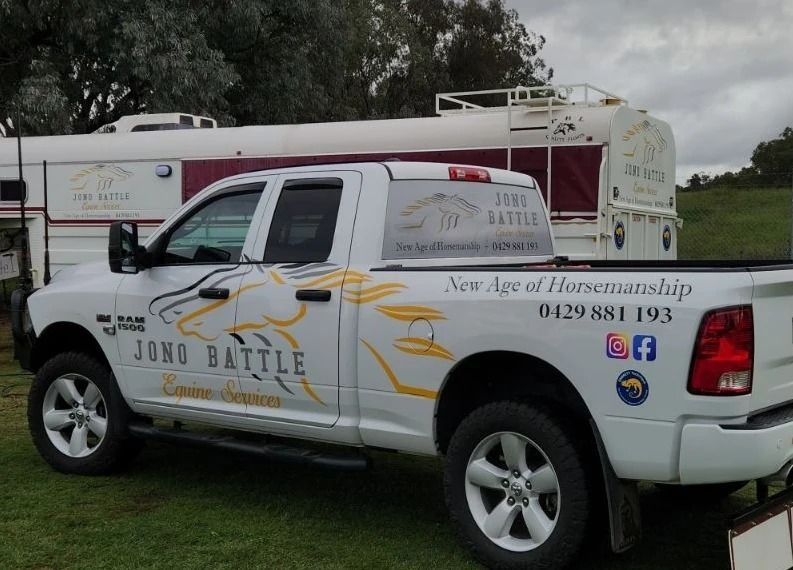 A White Truck That Says Jumbo Bottle On The Side — Jono Battle Equine Services In Hunter Region, NSW
