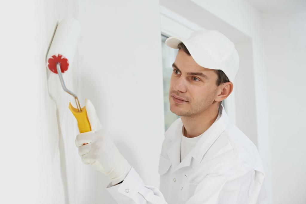 Man Painting The House Interior