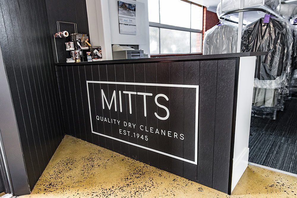 mitts dry cleaners front desk