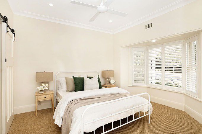 Stylish Bedroom Featuring Elegant Window Shutters — Southern Blinds & Awnings In Balaclava NSW