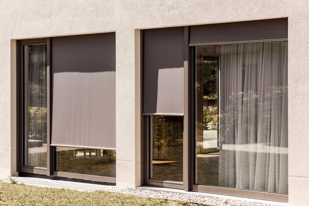 Outdoor Fabric Roller Blinds Providing Sun Protection — Southern Blinds & Awnings In Bowral NSW