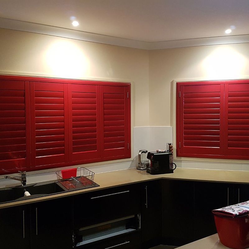 Stylish Red Plantation Shutter Enhancing the Kitchen Space — Southern Blinds & Awnings In Wilton NSW