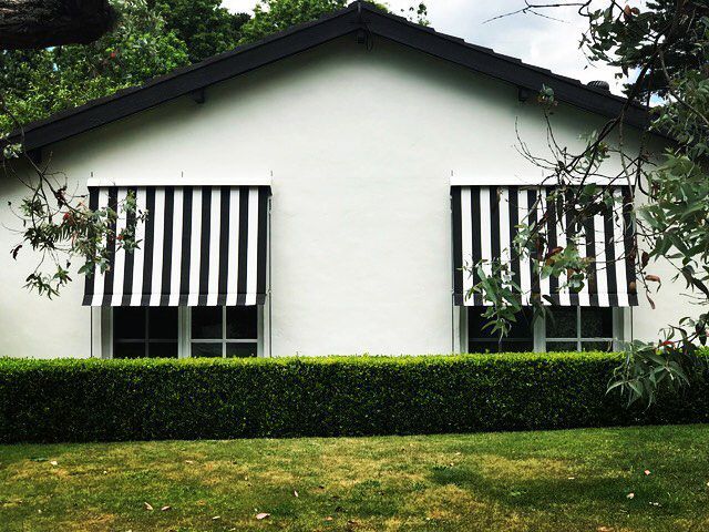 Two Windows with Installed Awning — Southern Blinds & Awnings In Wilton NSW