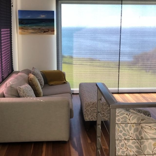 Living Room Ambiance with Stylish Window Shade Blinds and Sofa — Southern Blinds & Awnings In Wilton NSW
