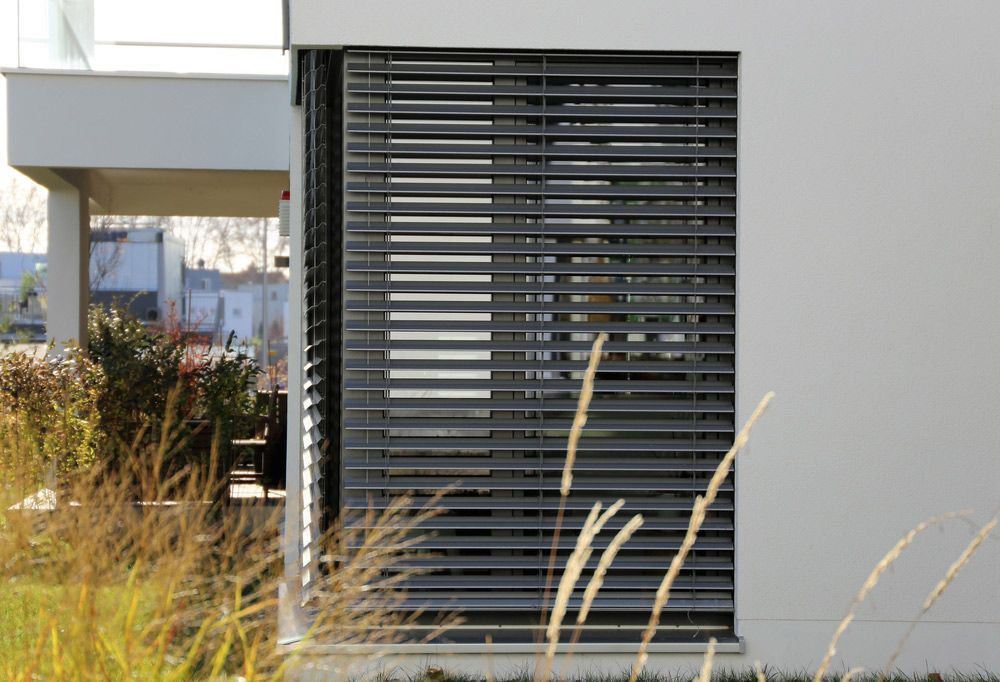 Window adorned with Exterior Shutter for Stylish Appeal — Southern Blinds & Awnings In Sutton Forest NSW