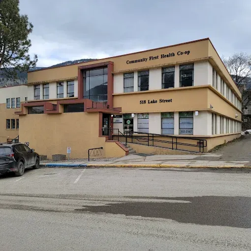 Two-story tan building, 