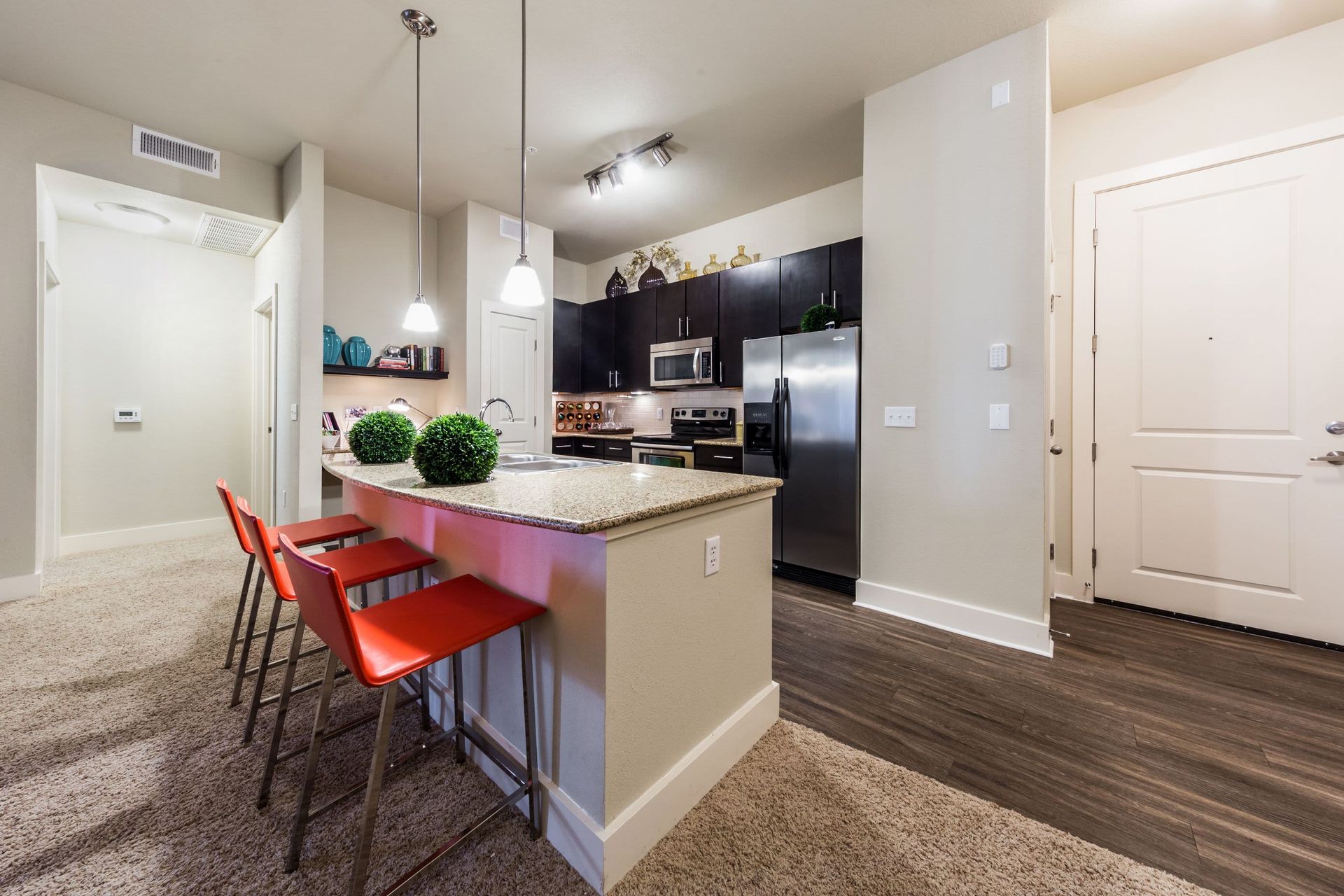 Modern Kitchen and Spacious Island with Bar Seating at The Marq at Ridgegate