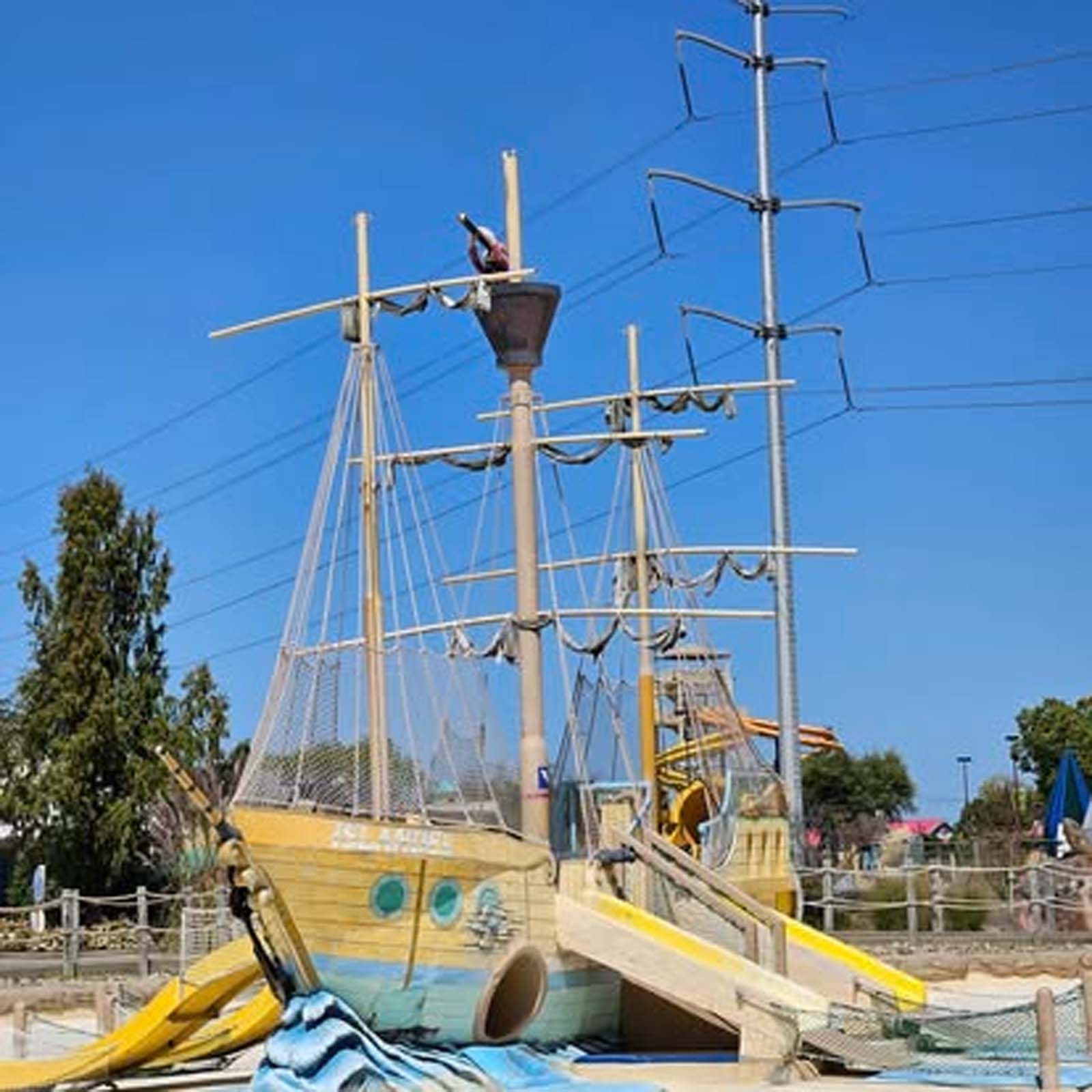 A pirate ship with a slide attached to it