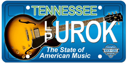 A tennessee license plate with a guitar on it