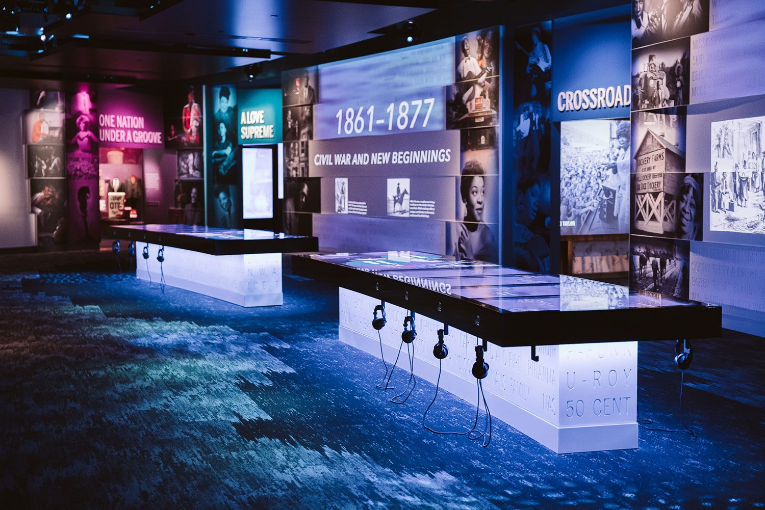 A room with tables and a wall that says 1861-1877