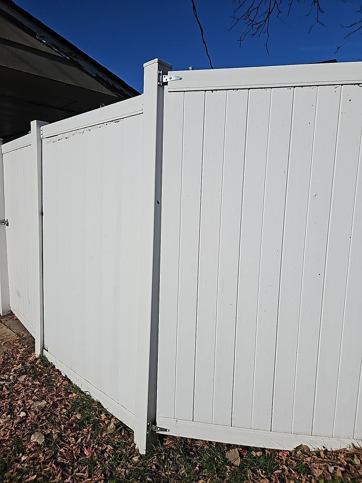 a chimney is sitting on top of a roof with shingles .