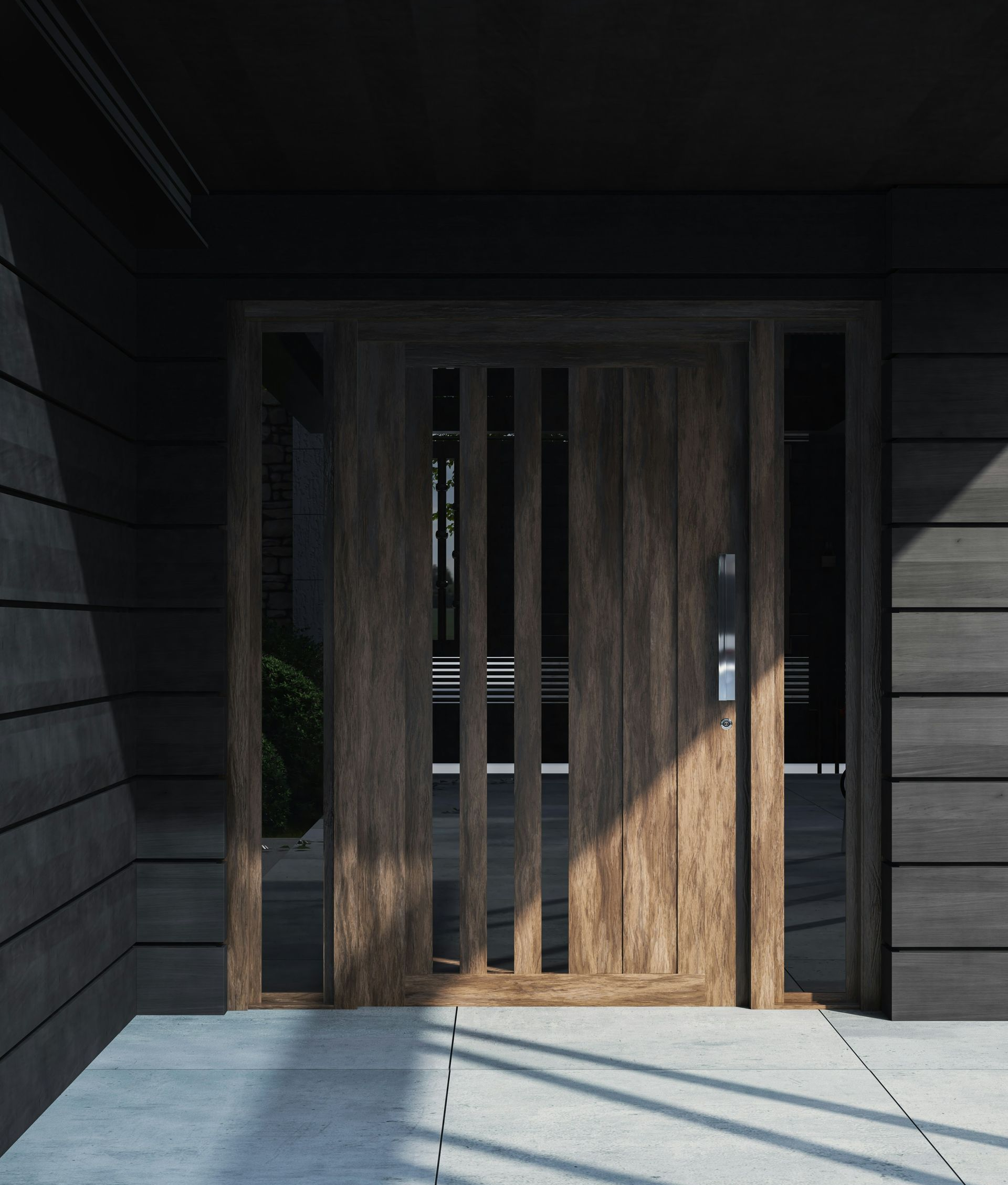 A modern wooden front door with vertical glass panels, set in a dark-sided entryway with a concrete porch.