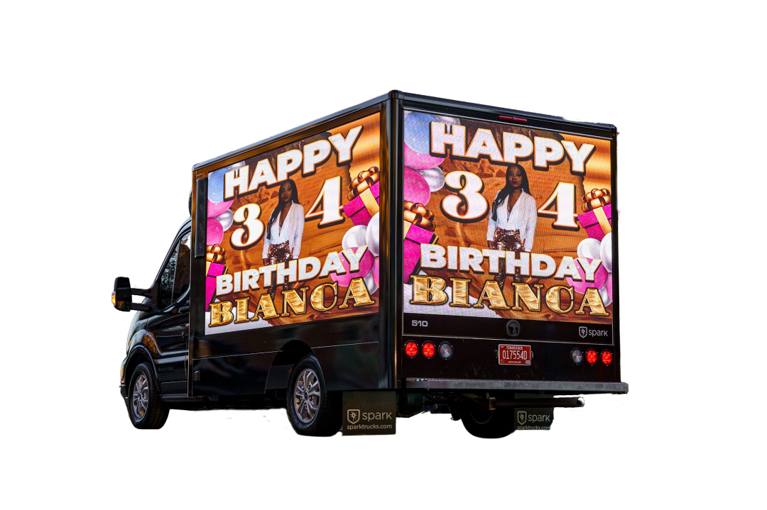The back of a birthday truck mobile billboard with a happy 34th birthday message on it.