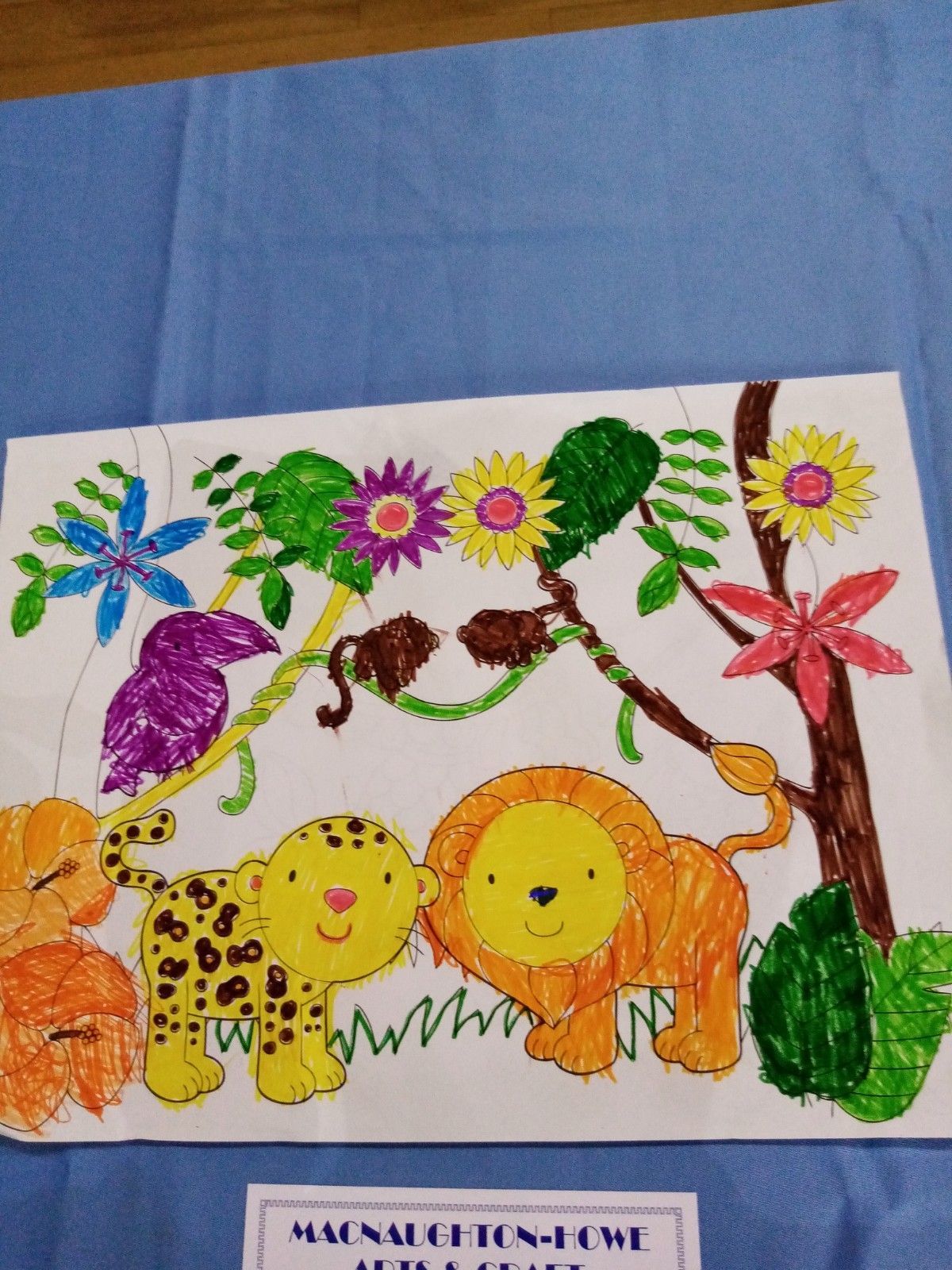 A child 's drawing of a lion and a leopard