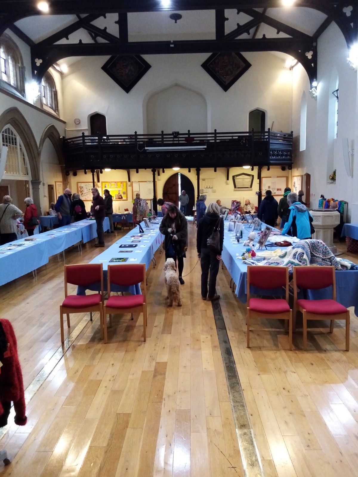 A large room with tables and chairs in it
