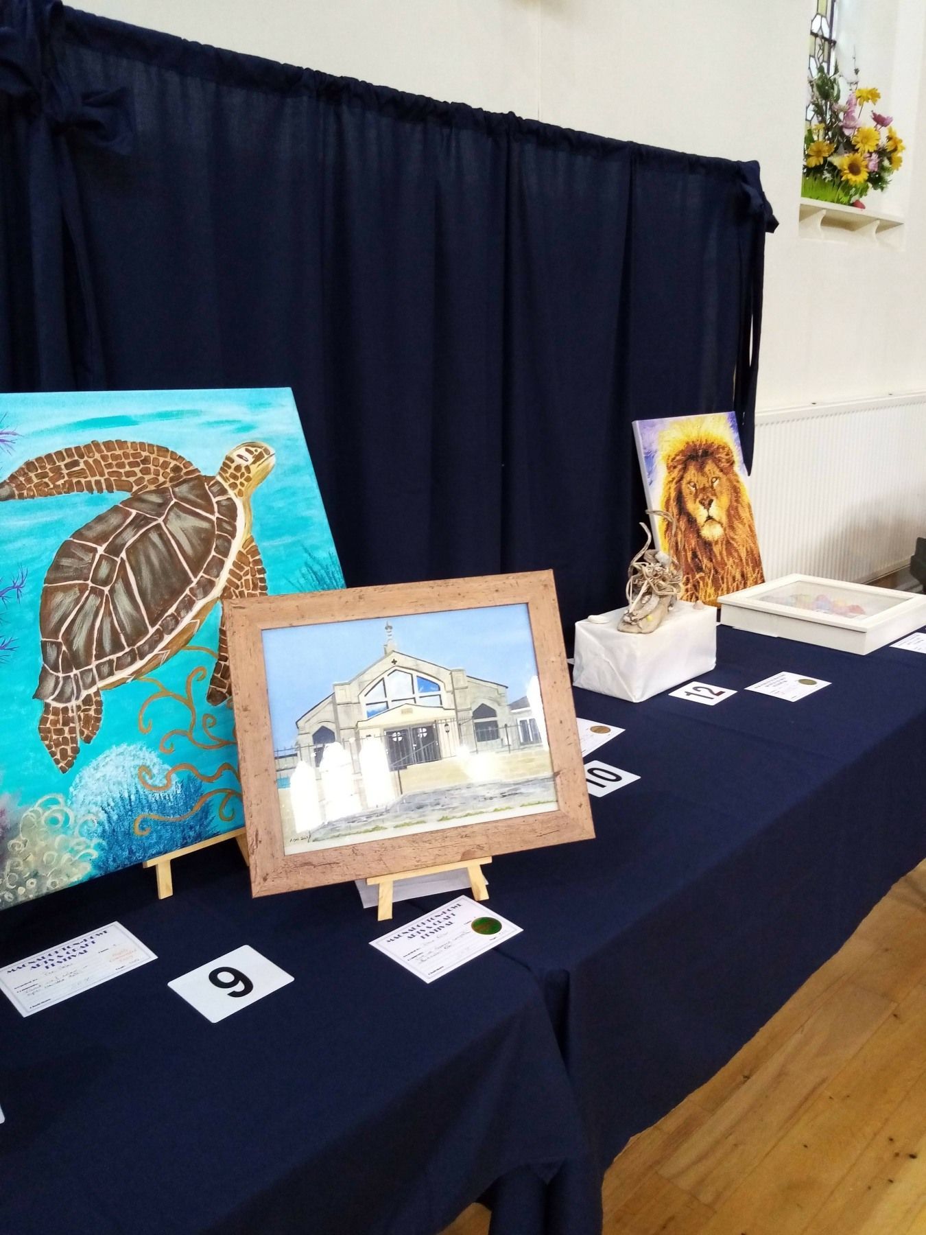 A table with a painting of a turtle on it