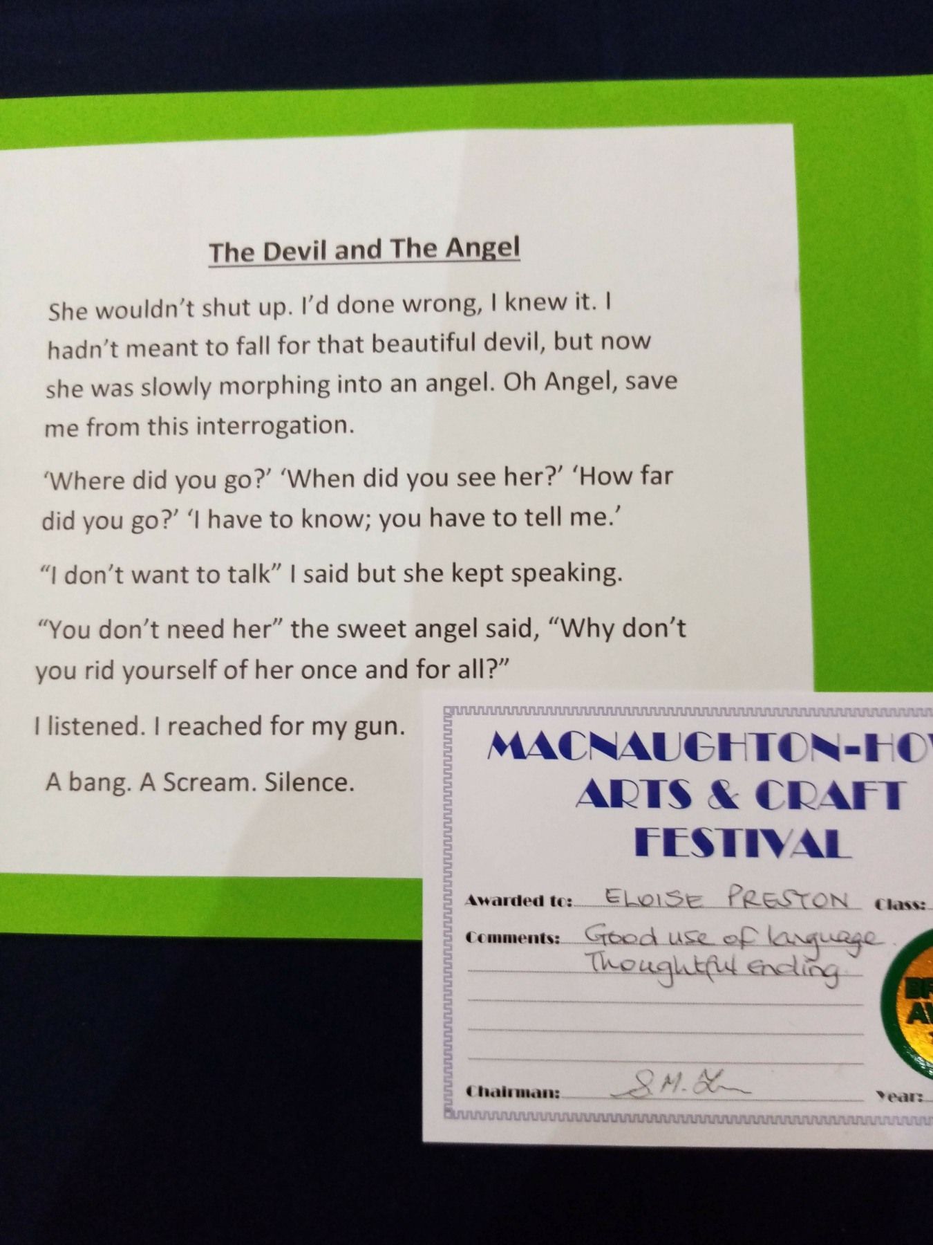 A piece of paper that says the devil and the angel on it