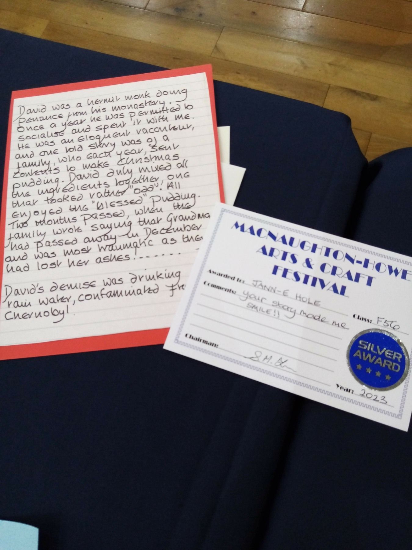 A piece of paper that says ' main street arts festival ' on it