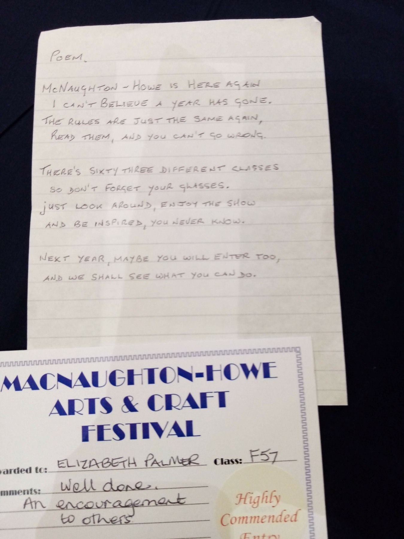 A piece of paper that says macnaughton-howe arts & craft festival