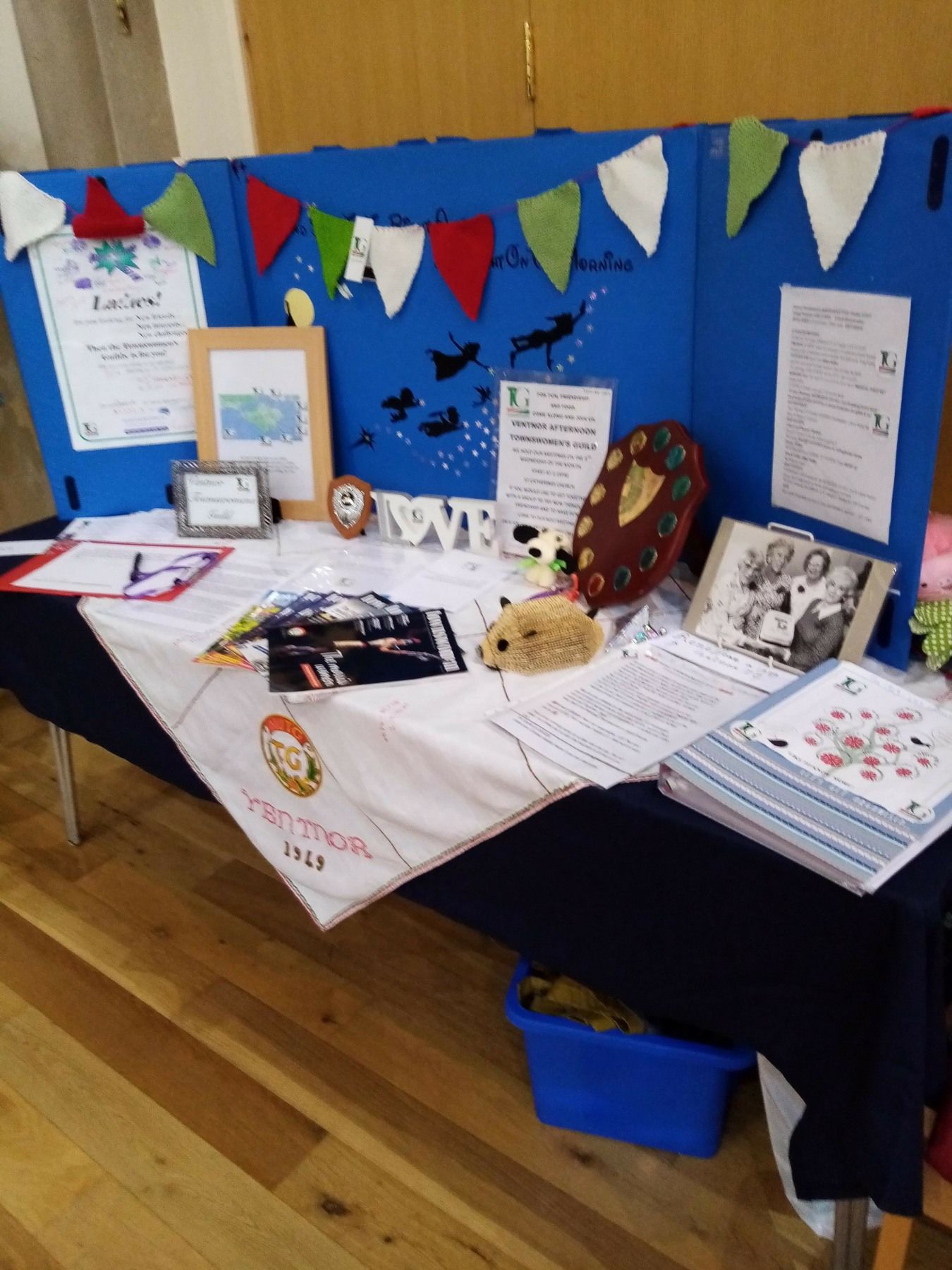 A table with a cloth that says ' i love you ' on it