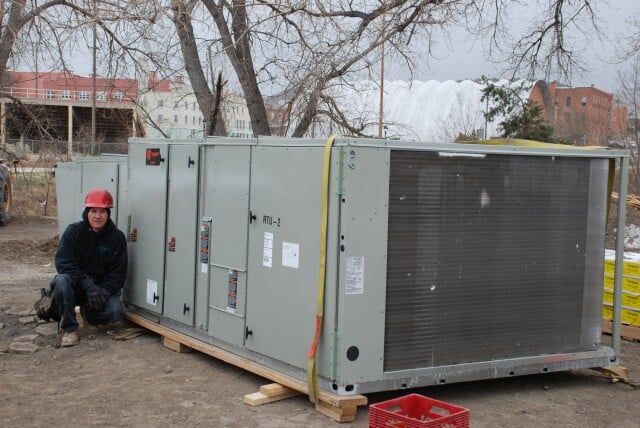 Hvac worker with red safety hat - AC repairs in Trinidad, CO