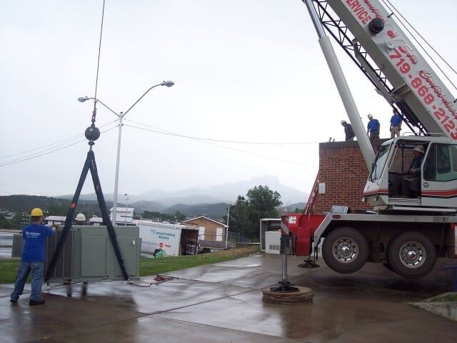 men in blue setup hvac - AC repairs in Trinidad, CO