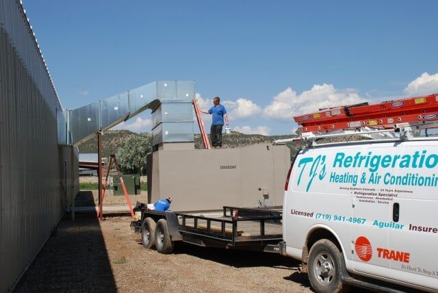 men installing hvac - AC repairs in Trinidad, CO